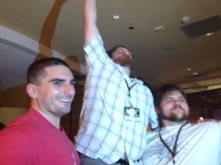 Brian McClellan, reveling in his moment of tallness, being held aloft by Justin Landon and Sam Sykes.