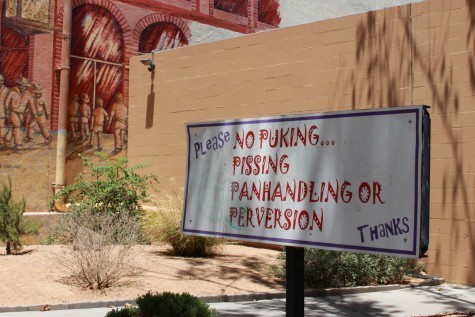 Oh, those wacky masses. (Sign in Albuquerque.)