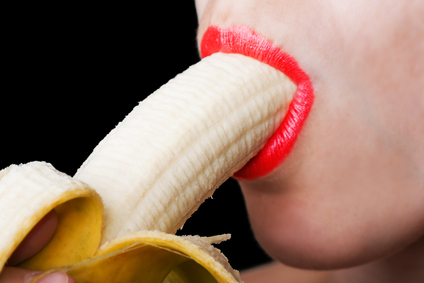 Women eating banana
