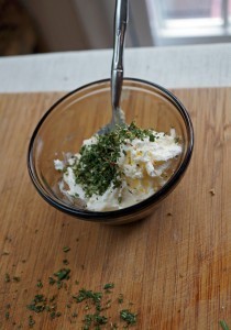 mixing the herbs in