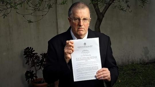 Ex priest Greg Reynolds with a letter from the Vatican which has ex communicated him.
