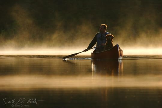 man-and-his-dog-in-canoe