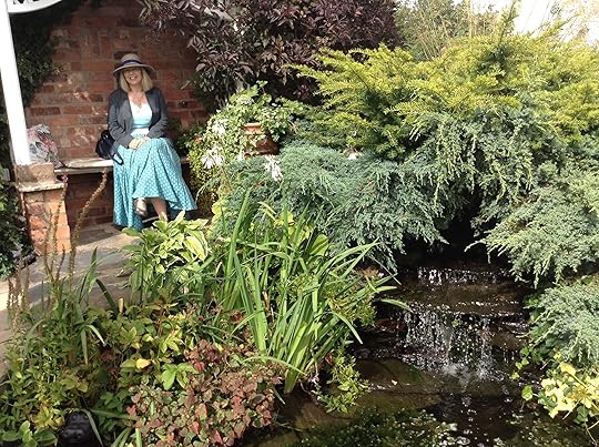 Enjoying a shady 'small enclosed space' in a private Kenilworth garden open for the National Gardens Scheme 1 Sep 2013 (photo credit: Abigail Robinson)
