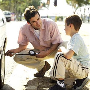 father talking to son