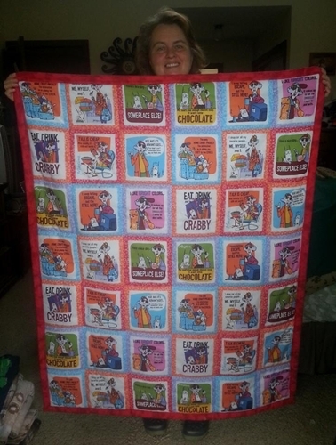 photo of Sheri holding the blanket