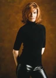 Rene Russo- Thomas Crown Affair