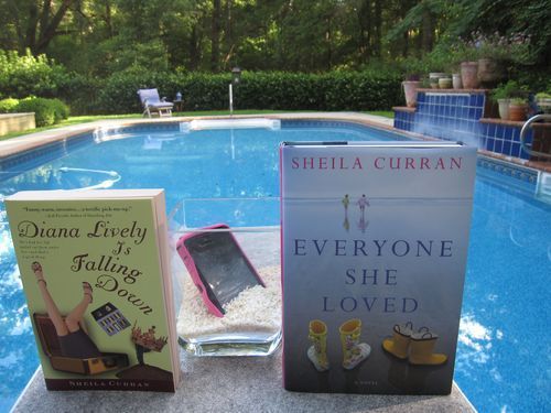 Iphone with books on diving board