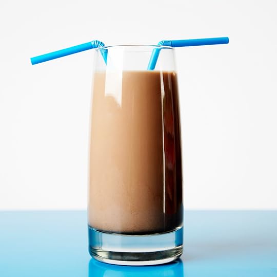 Glass of Chocolate Milk with Two Straws