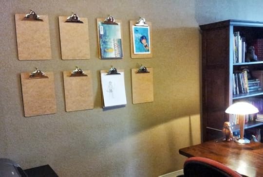 The clipboards will hold fan art, book covers, sketches, magazine clippings, photographs, etc.