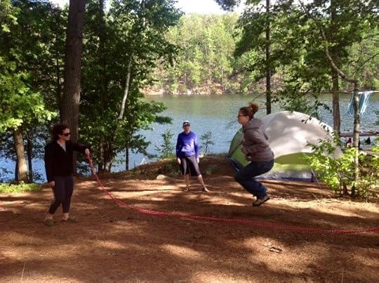 Author Stacey D. Atkinson skipping in the woods