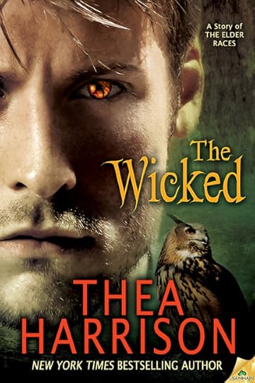 An amber-eyed man, with some sexy scruff on his jaw glares and an owl looks away