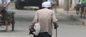 Old lady walking Asia