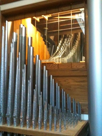 Pipes in front of and behind glass baffles