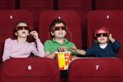 14730026-children-watching-a-movie-at-the-3d-cinema