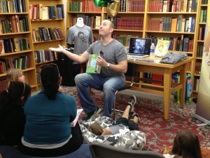 Adam Reading in Bookstore