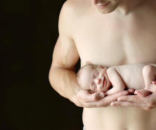 man-holding-baby fathers day