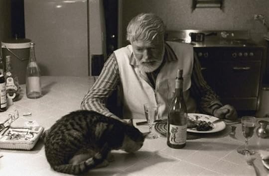 Ernest Hemingway and one of his cats