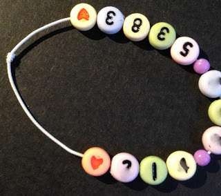 Photo of finished phone number bracelet