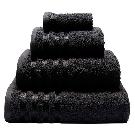 A pyramid of black towels
