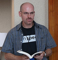 Here's me in my standard con-wear. Casual, approachable and just a little nerdy.