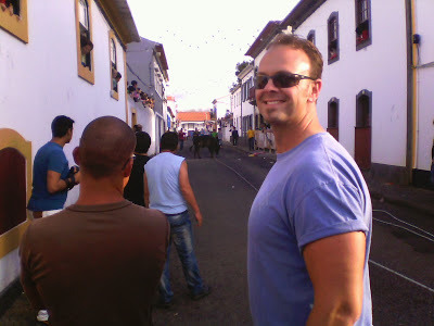 Travis Bowman in the street during a traditional Portuguese bullfight on Terceira Island, Azores