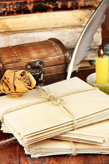 bigstock-Stacks-of-old-letters-on-woode-43415203