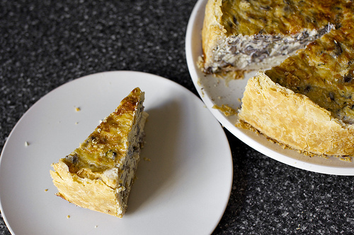 a tall wedge of mushroom quiche