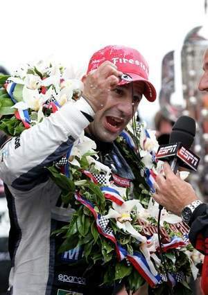 Tony Kanaan Holding Necklace (Mark J. Rebilas-USA TODAY Sports / USA TODAY Sports)