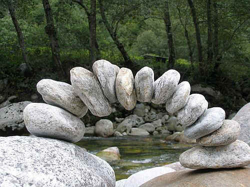 stone-arch-swiss-river