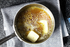 adding butter, hiss, fizz