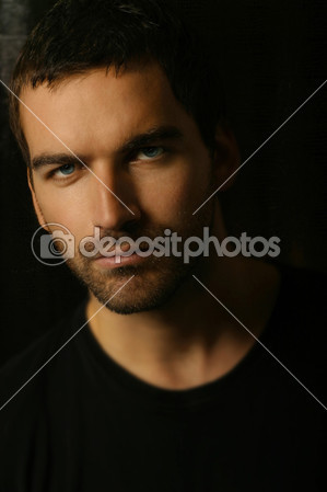 Portrait of young good looking male model by Francesco Cura - Stock Photo