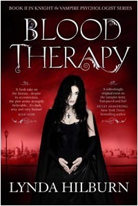 The cover is a dark red and a woman stands in the center. She's got long straight black hair, wearing a black fancy dress with a cape and fingerless full length gloves. She's wearing a cross and wary glare.