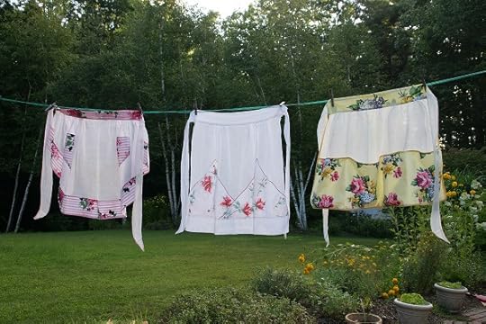 Three aprons. My mother gave me the middle one years ago.