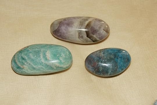 From left, Amazonite, Chevron Amethyst, and Blue Apatite