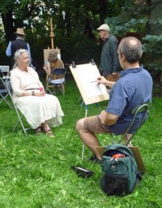 Richard is drawing a lovely lady who volunteered to pose for him.