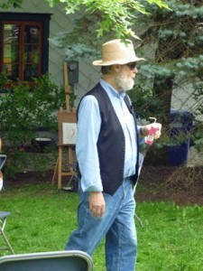 Luceien Lanoie ran the 20-minute sessions and helped portrait artists as he walked around the area.