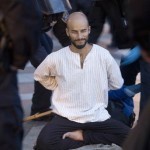 Picture of Pancho Ramos Stierle, and two other meditators who were arrested on the steps of Oakland City Hall during the second Occupy Oakland police sweep.