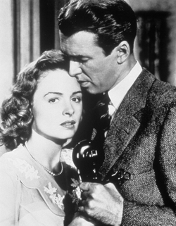250px-Donna_Reed_with_James_Stewart_(1946)