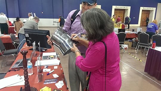 Robin Hobb signing the Great Helm which /r/Fantasy is donating to Worldbuilders. Robin is about the nicest person in the world, as evidenced by her signing one of her books for me as well.