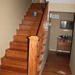 Stairs prior to installing wainscoting and skirtboard; newel post was my design (second one I built -- I always screw up the first one)