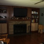 The living room today: doors are installed on the bottom of the shelves but still need to be finished, need magnetic catches, and need nobs