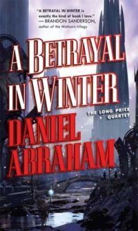 Cover art for A Betrayal In Winter by Daniel Abraham, featuring a grey and blue toned city of tall towers, with a low bridge in the foreground