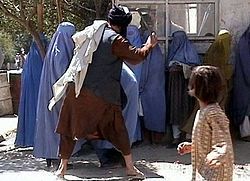 Taliban_beating_woman_in_public_2001