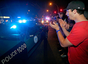 Police are applauded after Tsarnaev is captured