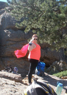 Super hero cape while rock-climbing