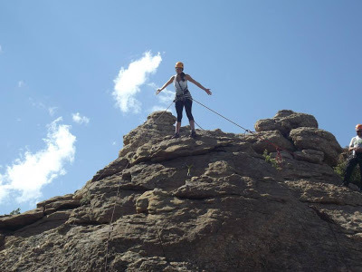 Showing off while repelling in Estes Park