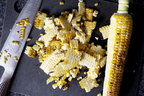 de-cobbing the charred corn