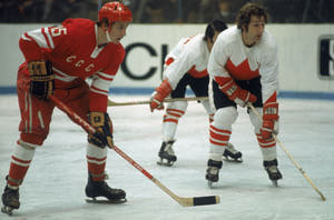 Alexander Yakushev of the Soviet Union and Rod Seiling of Team Canada during the 1972 Summit Series.