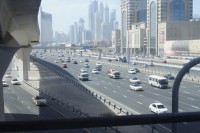 22 lanes of traffic on Sheikh Zayed Road in Dubai. Note the sand blowing over the nearest lanes.