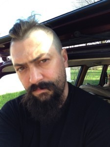 picture of a tough caucasian male with a mohawk, aka Bryan Davis